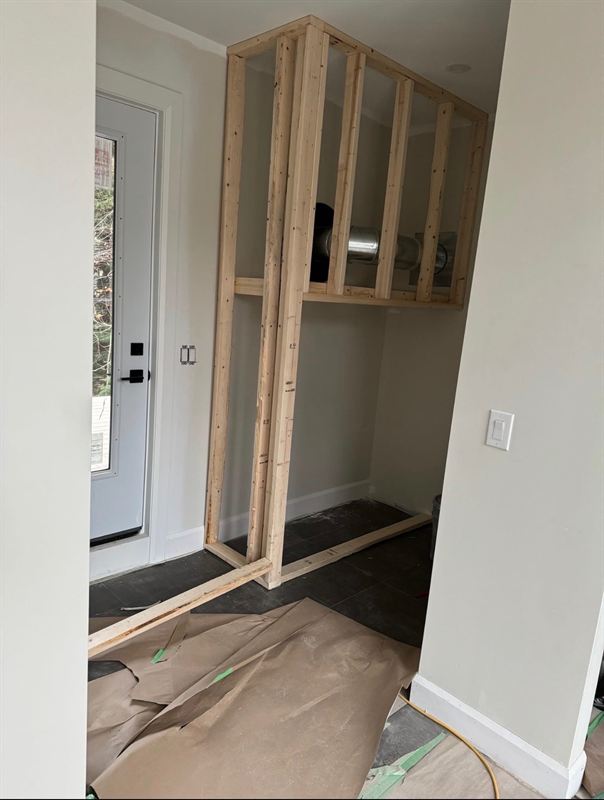Residential closet framing with duct enclosure